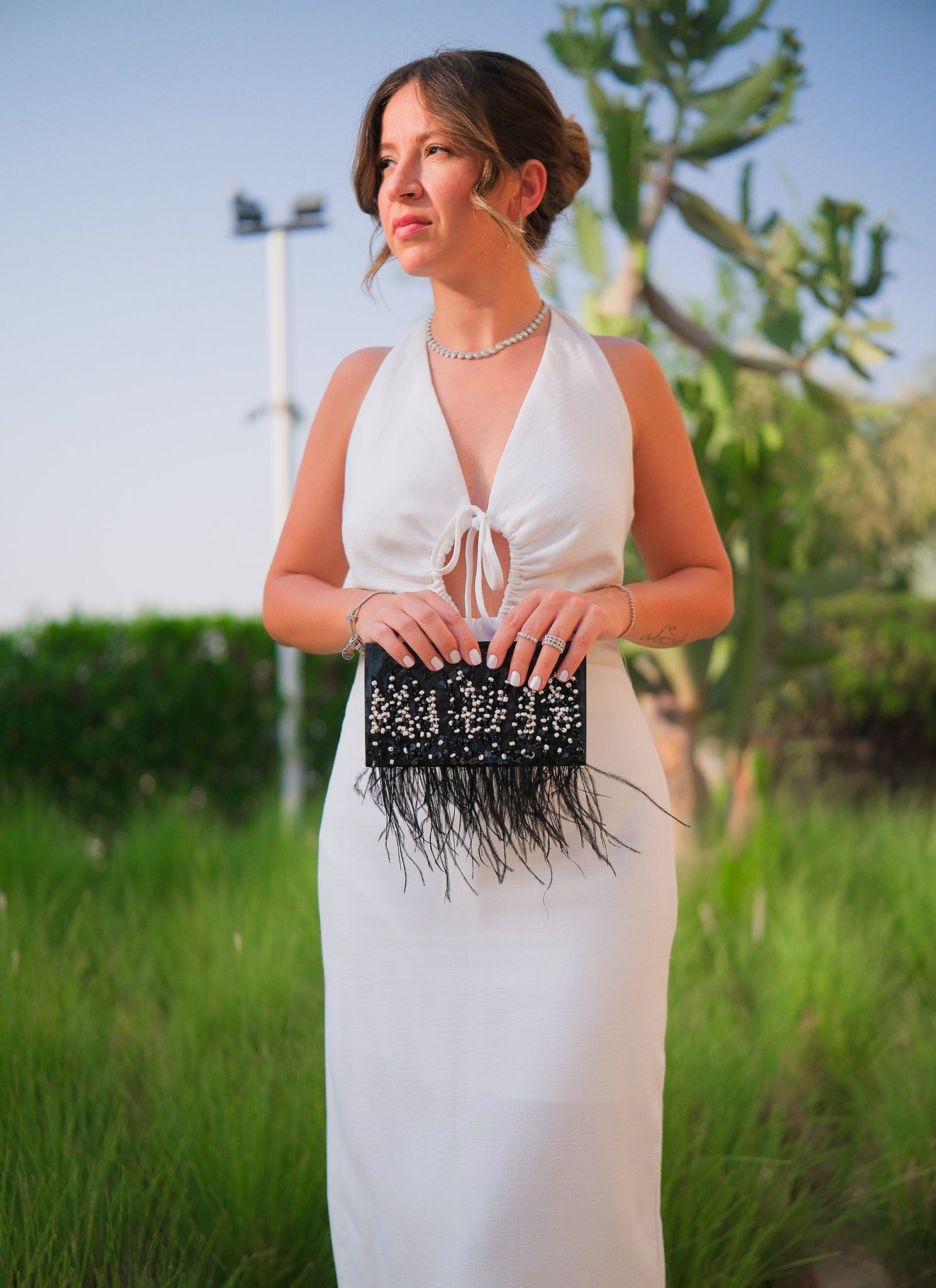 Elegance In The Dark Feather Bag